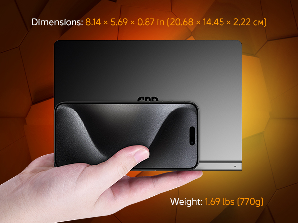 GPD Pocket 4 4 The GPD Pocket 4 placed alongside a smartphone, highlighting its compact size (8.14 x 5.69 x 0.87 inches) and lightweight design (1.69 lbs/770g), making it highly portable for on-the-go professionals